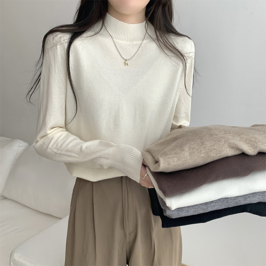 Pull fin en tricot pour femme avec un col montant moderne et une coupe décontractée Chic & Stil