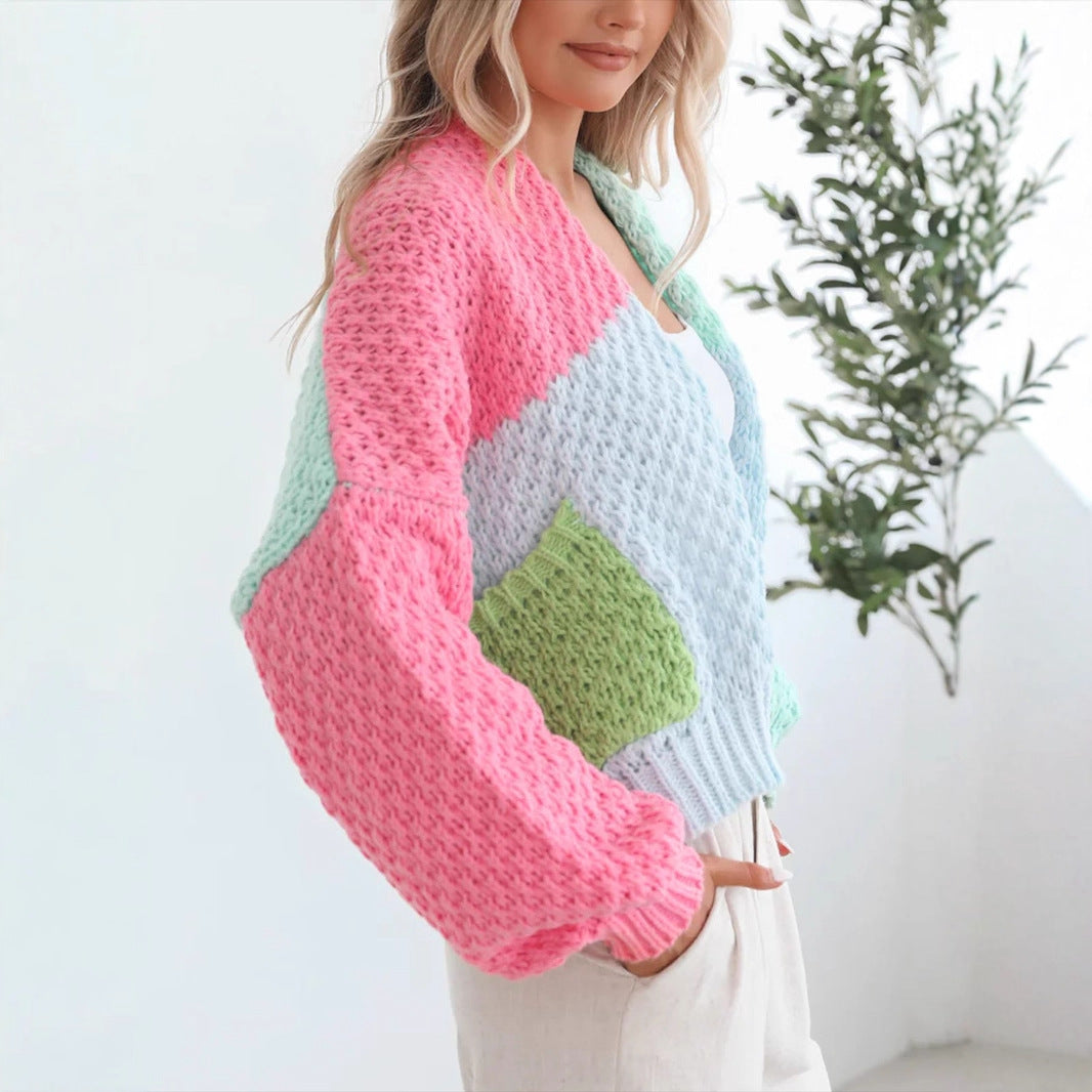 Comfortable knitted sweater for women with oversized sleeves and a combination of colors Lune London