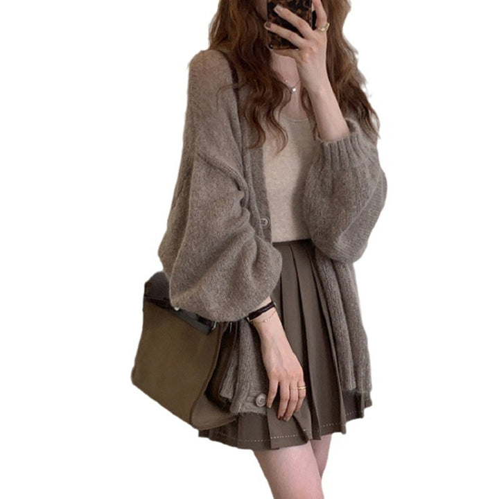 Oversized casual knit jacket for women with voluminous sleeves and practical pockets Lune London