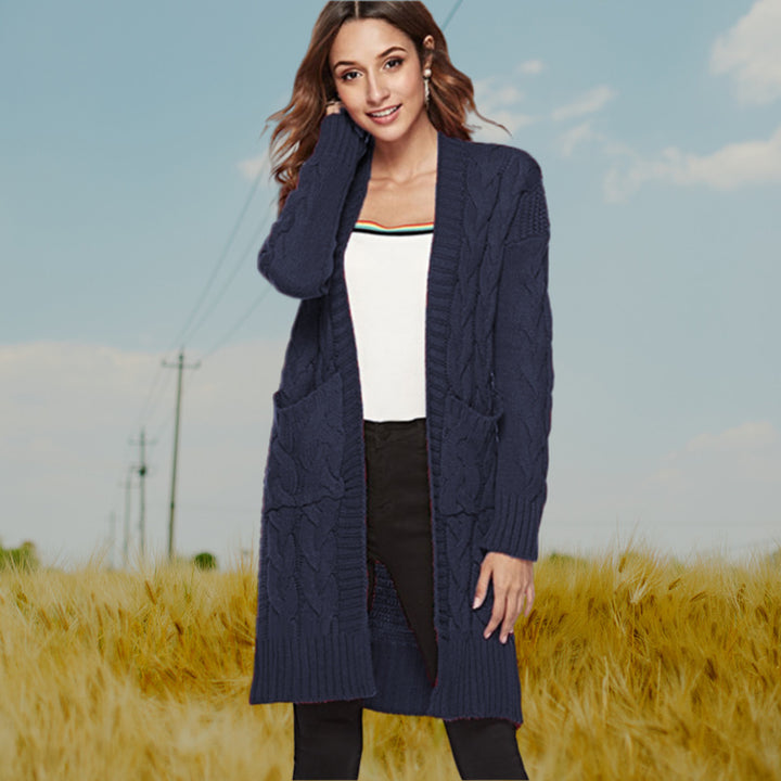 Chunky knit cardigan for women with an elegant cable design and practical pockets Lune London