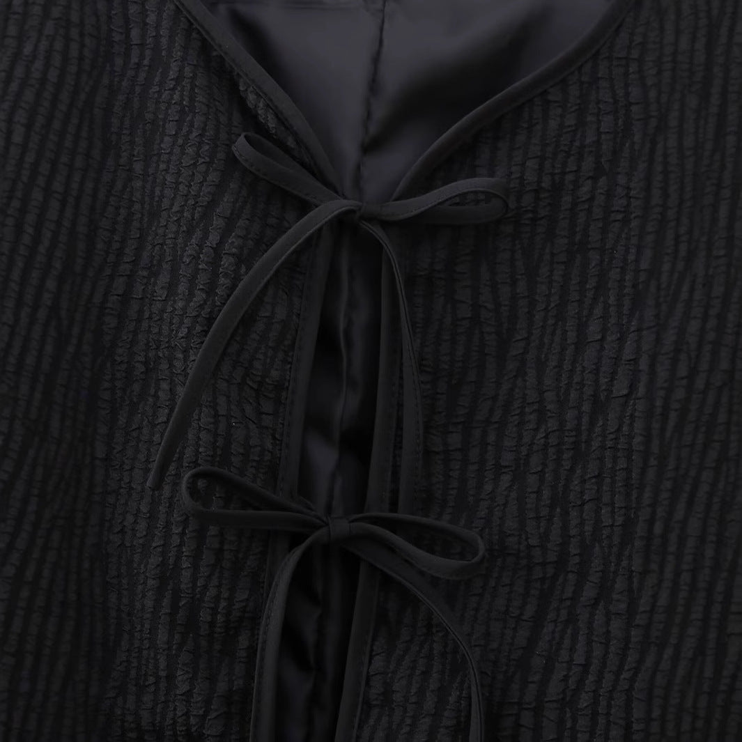 Elegant ladies' down jacket with elaborate ruffle details and high collar Lune London