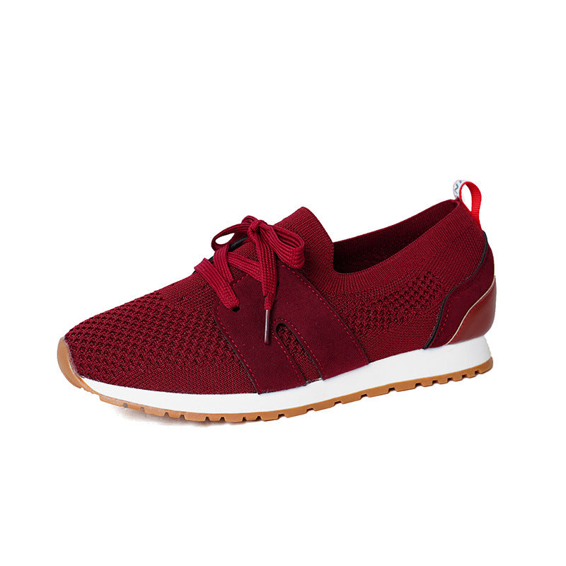 Women's sports sneakers with a breathable knitted upper and elastic accents Lune London