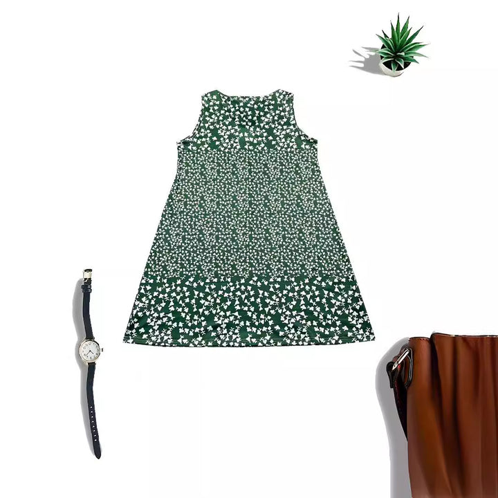 Airy summer dress for women with a playful floral pattern and a fluid silhouette Lune London