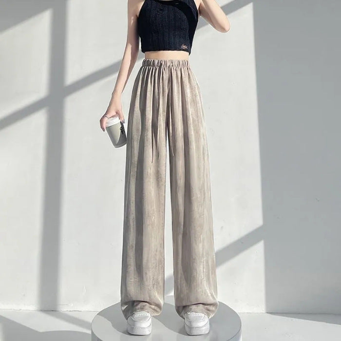 Women's high-waisted palazzo pants made of lightweight, breathable material with an elastic waistband