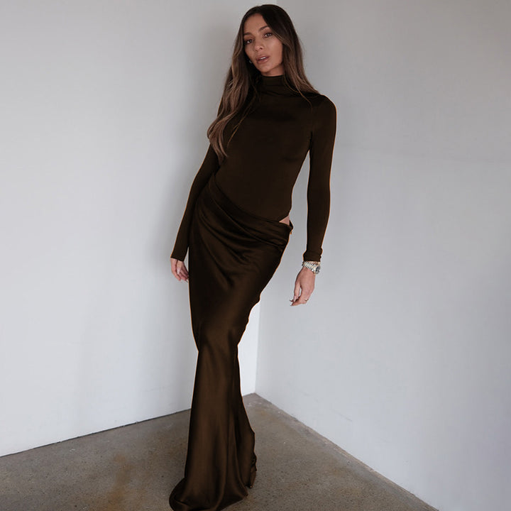 Elegant long sleeve maxi dress for women with a fitted cut and refined draping detail Lune London