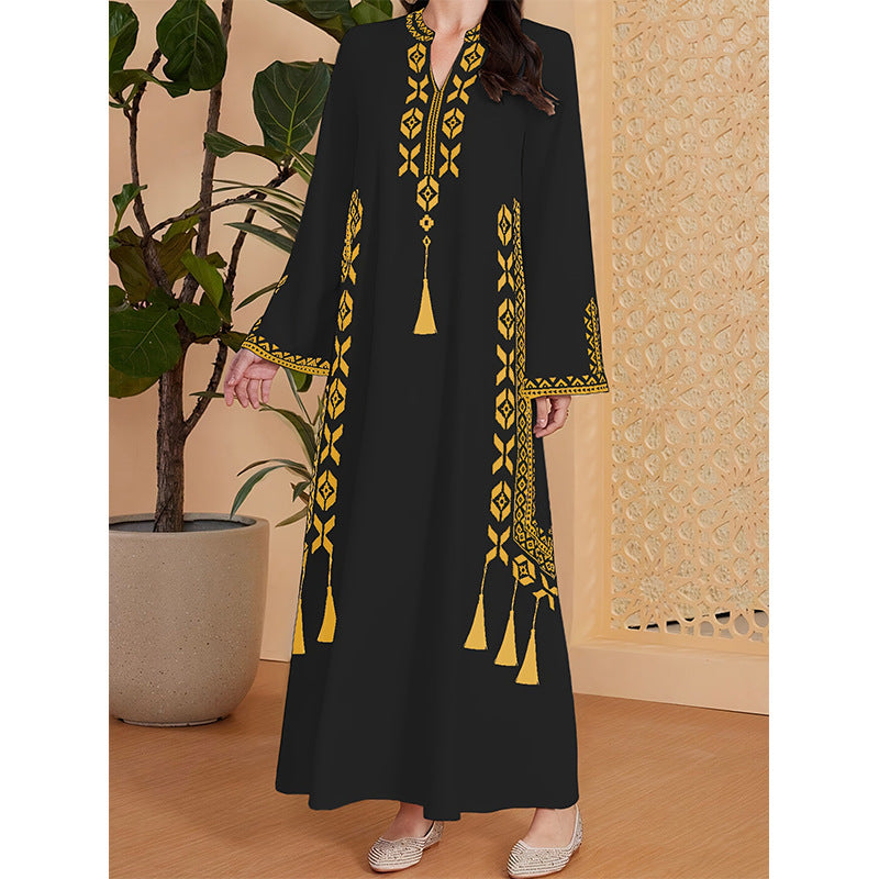 Caftan dress for women with an artistic embroidered design and an elegant V-neck Lune London
