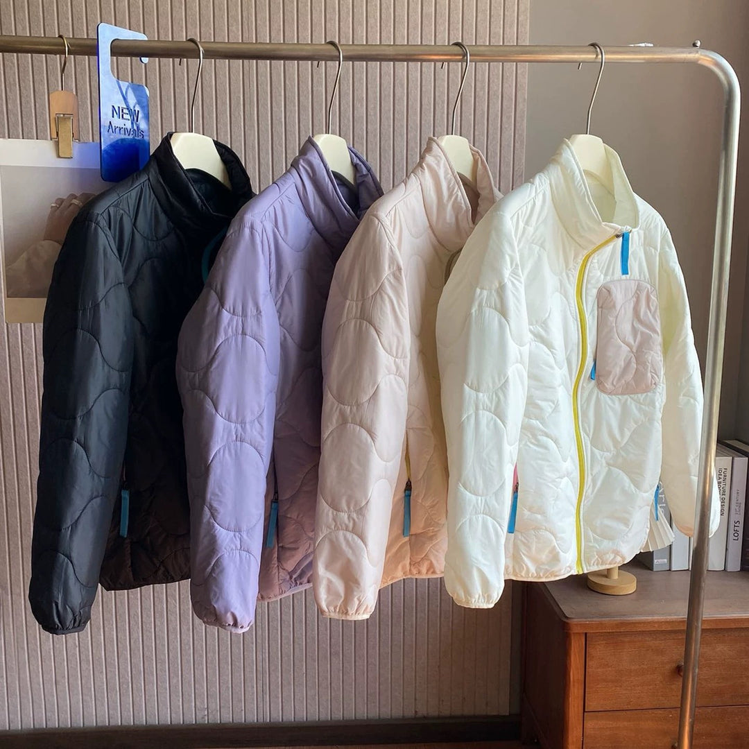 Veste matelassée légère pour femmes avec col haut et poches pratiques Chic & Stil