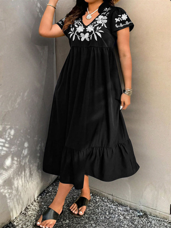 Maxi dress for women with embroidered floral design and voluminous skirt Lune London