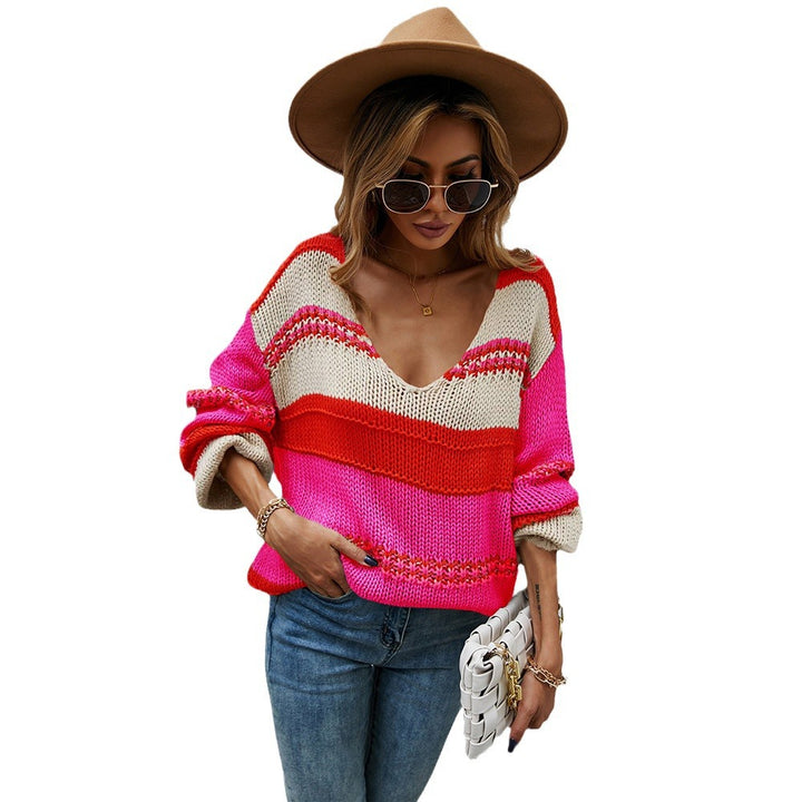 Pull féminin en design tricot décontracté avec col en V et blocs de couleur Chic & Stil