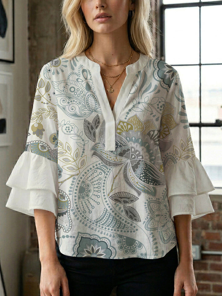 Women's blouse with voluminous ruffle sleeves and creative floral design Lune London