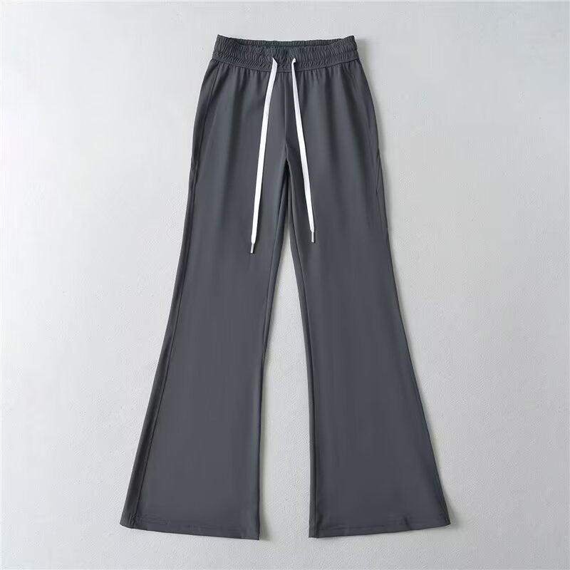 Pantalons évasés sportifs pour femmes avec taille élastique et poches pratiques Chic & Stil