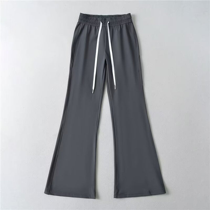 Pantalons évasés sportifs pour femmes avec taille élastique et poches pratiques Chic & Stil