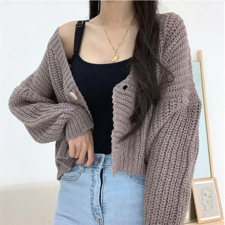 Ladies short cardigan with deep V-neck and special button details Lune London