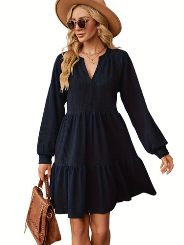 Casual women's dress with V-neck, puff sleeves, and ruffled hem Lune London