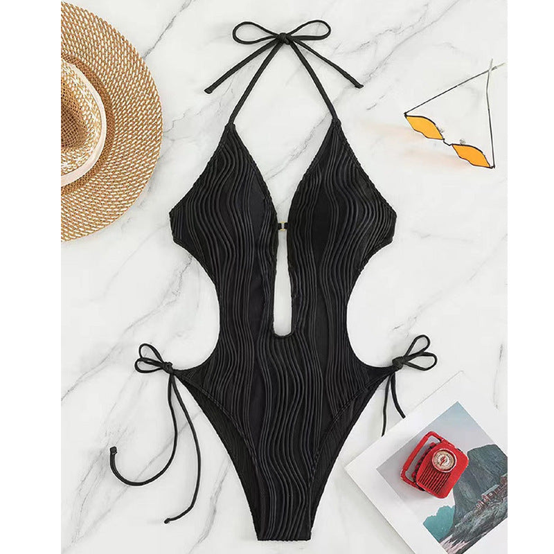 One-piece swimsuit for women with side ties and a deep V-neck Lune London