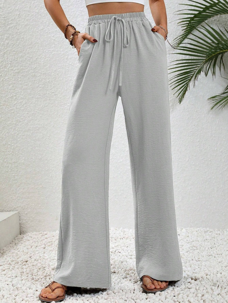 Loose-fit leisure pants for women with an elastic waistband and practical side pockets Lune London