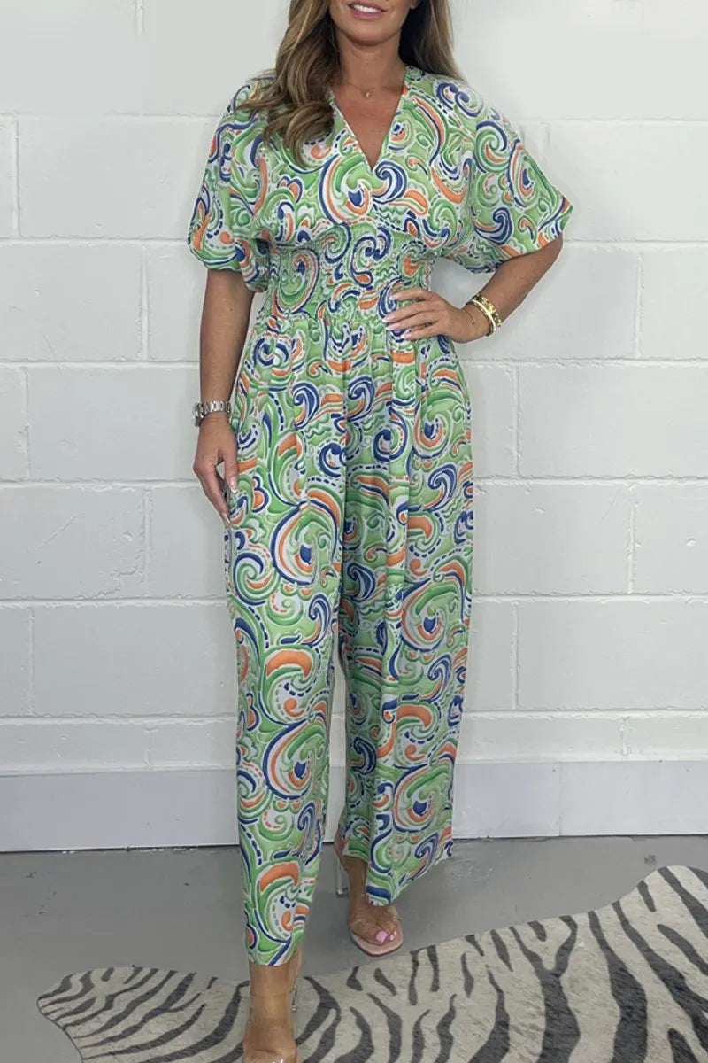 Lady Fluid jumpsuit with elegant paisley pattern and Lune London cinching