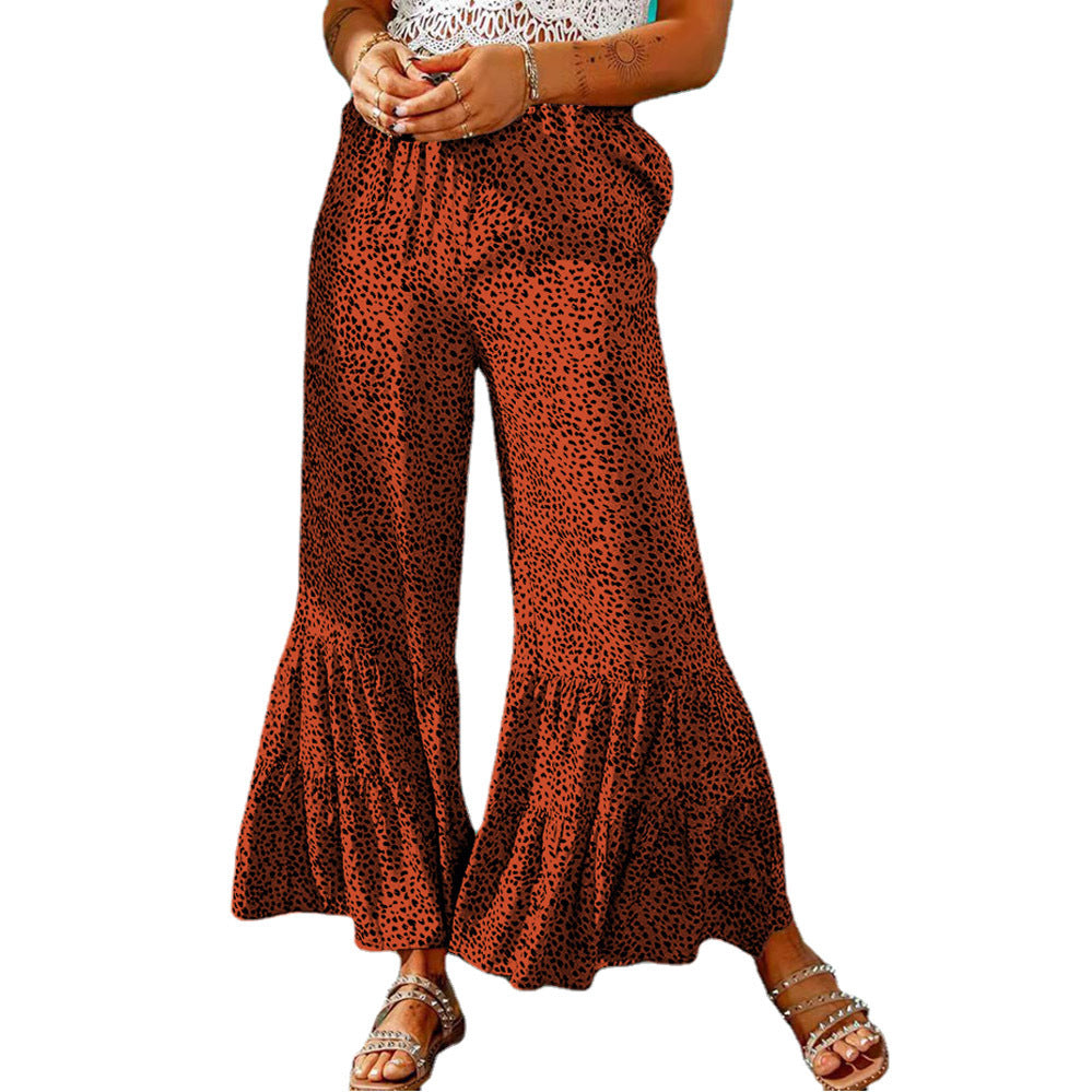 Wide leg palazzo pants for women with a voluminous hem and elastic waistband Lune London