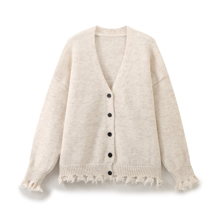 Casual knitted jacket for women with fringed hem and button closure Lune London