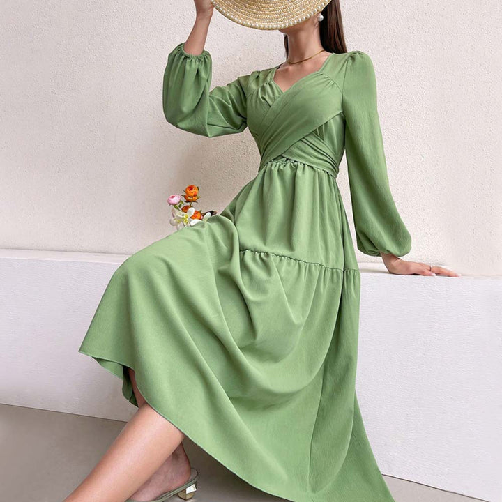 Robe midi pour femmes avec détail enveloppant et manches volumineuses Chic & Stil