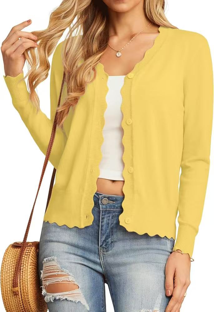 Elegant sweater for women with wavy hem Lune London