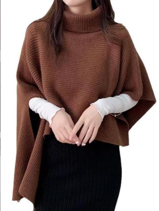 Ladies knitted poncho with high collar and asymmetrical cut Lune London