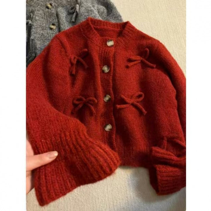 Cardigan pour femmes avec des nœuds décoratifs dessus