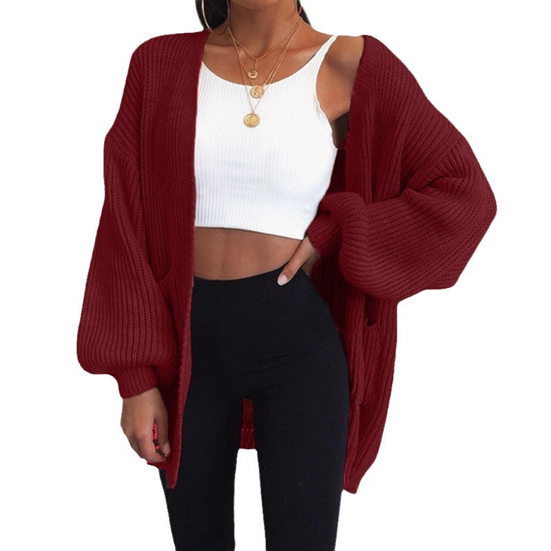 Cardigan en tricot épais pour femmes avec des manches surdimensionnées et des poches pratiques Chic & Stil