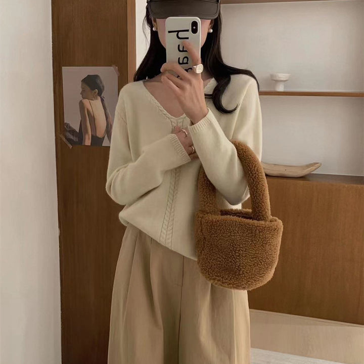 Pull élégant pour femmes en V avec un motif de câble fin Chic & Stil