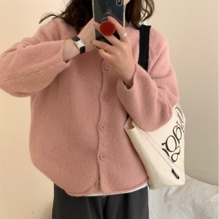 Cardigan confortable pour femmes avec détails de boutons et coupe ample Chic & Stil