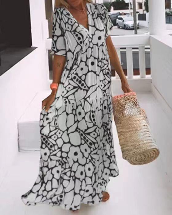 Maxi dress for women with an elegant V neck and a flowing cut Lune London