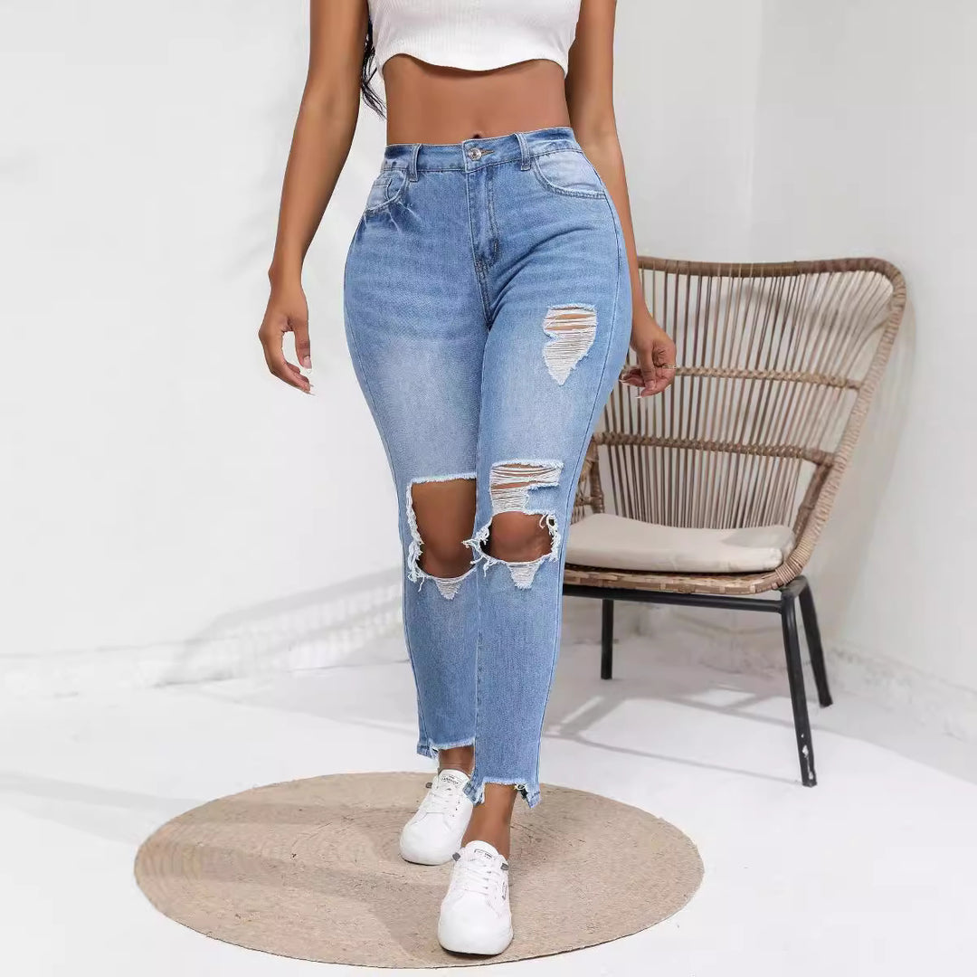 High-waisted women's jeans with ripped and fringed details Lune London