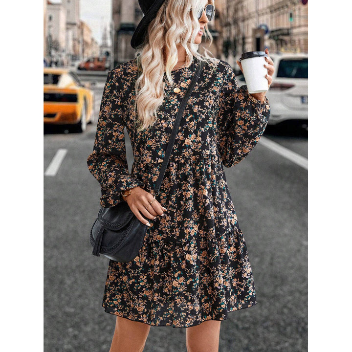 Casual dress for ladies with voluminous sleeves and playful floral accents Lune London
