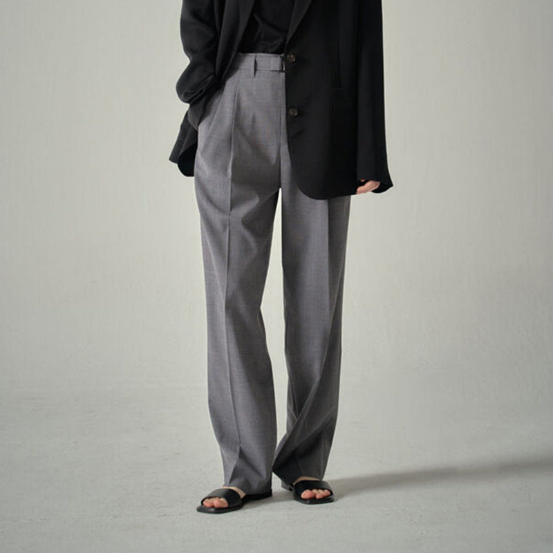 Elegant and widely cut women's suit pants with open side pockets Lune London