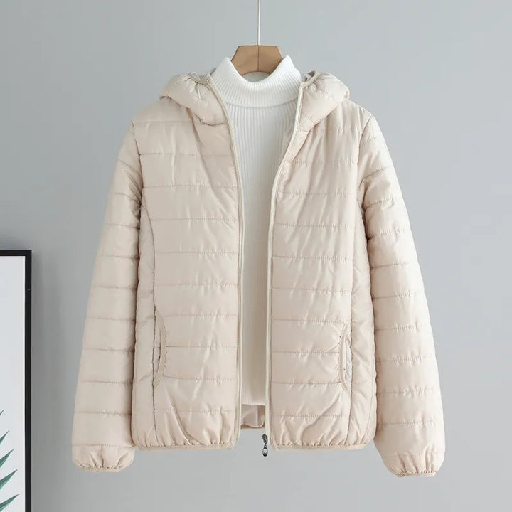 Ladies quilted transitional jacket with practical pockets and hood Lune London