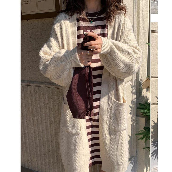 Ladies Thick Knit Cardigan with deep pockets and elegant Braid design Lune London