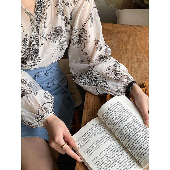 Women's blouse with floral pattern and button details Chic & Stil
