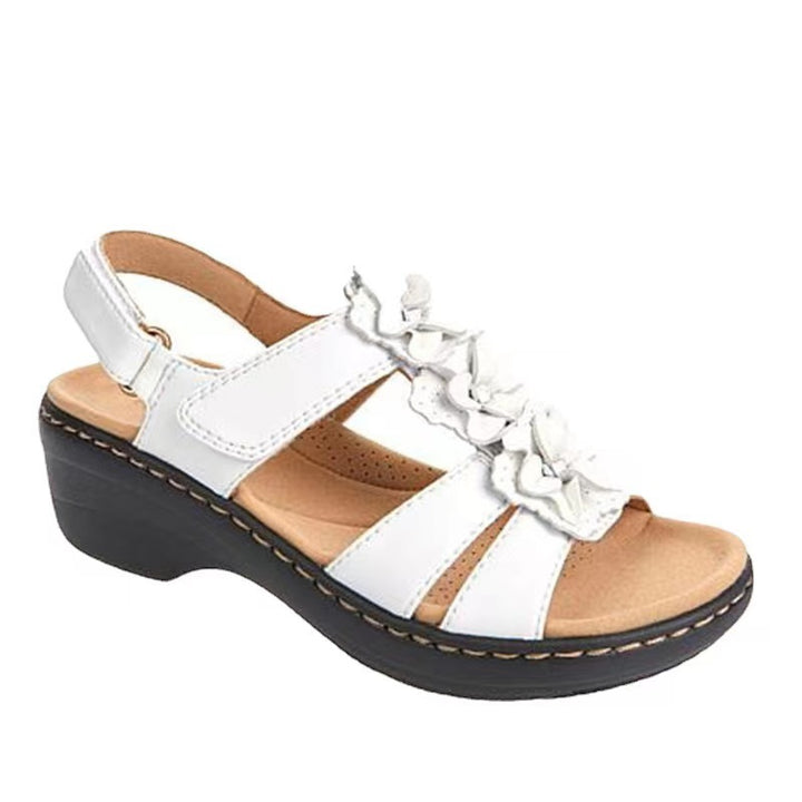 Comfortable wedge heeled sandals for ladies with delicate ruffle details Lune London