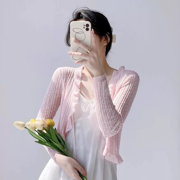 Women's knitted jacket with ruffle details and airy structure Lune London
