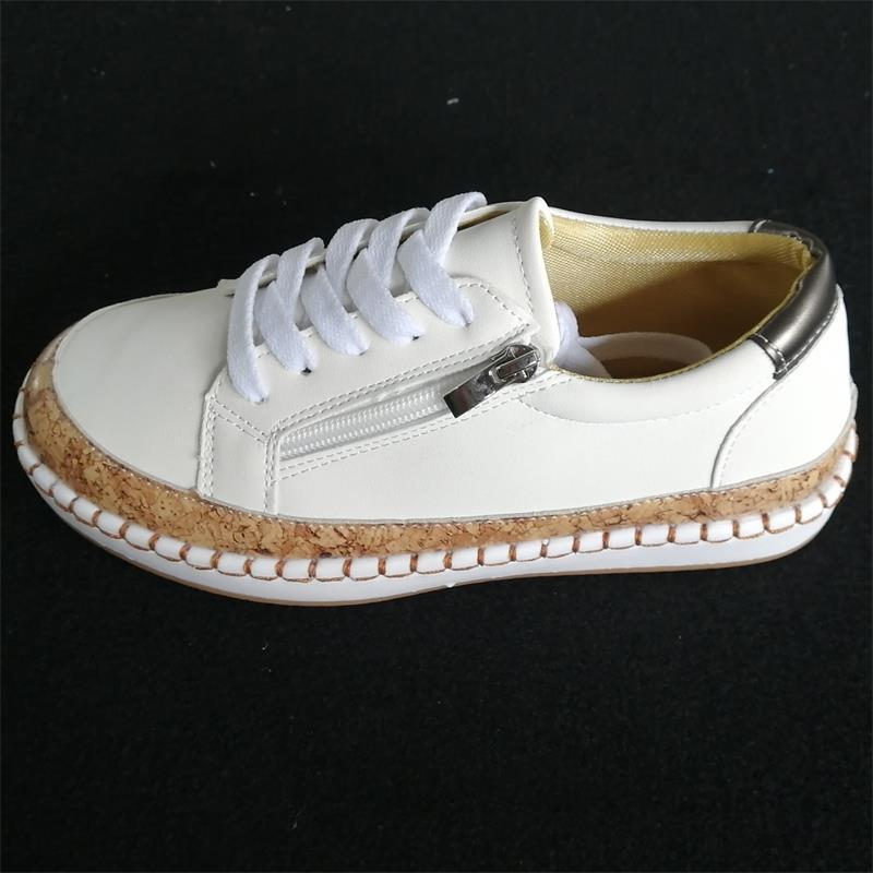 Comfortable ankle boots for ladies with cork sole and zipper Lune London
