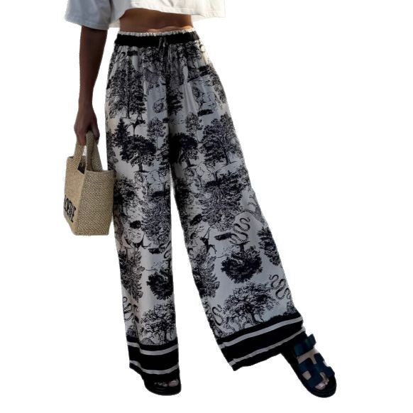 Wide palazzo pants for Damen with floral pattern and elastic waistband Lune London