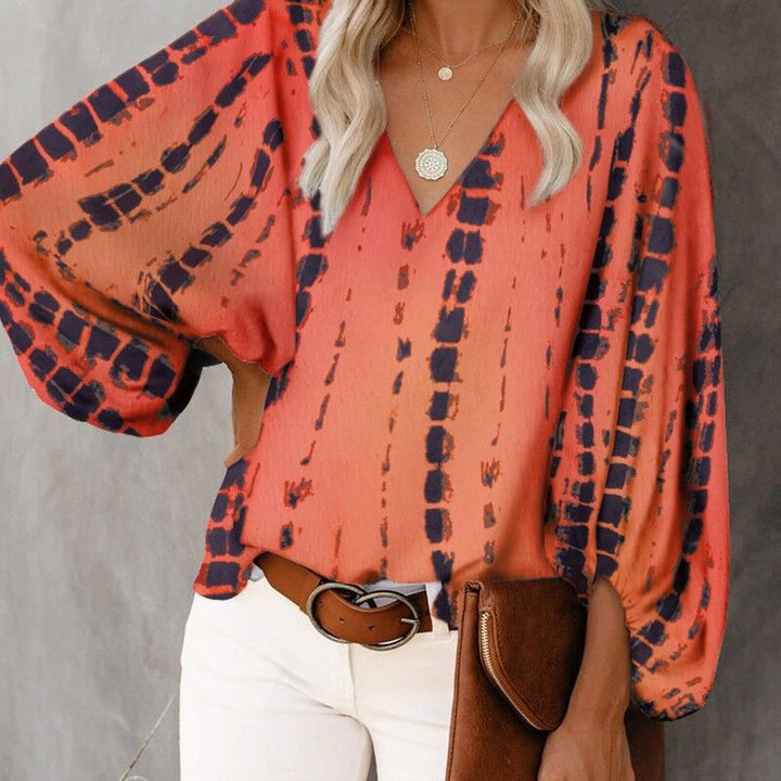Blouse féminine à la mode avec des manches larges et un col en V Chic & Stil