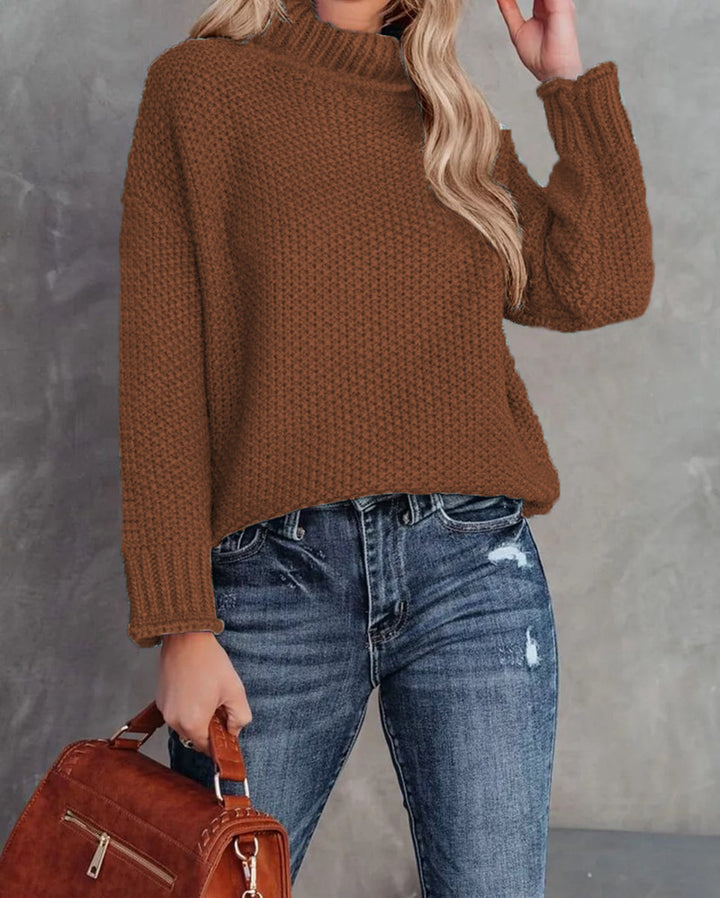 Comfortable knitted sweater for women with a high collar and airy structure Lune London