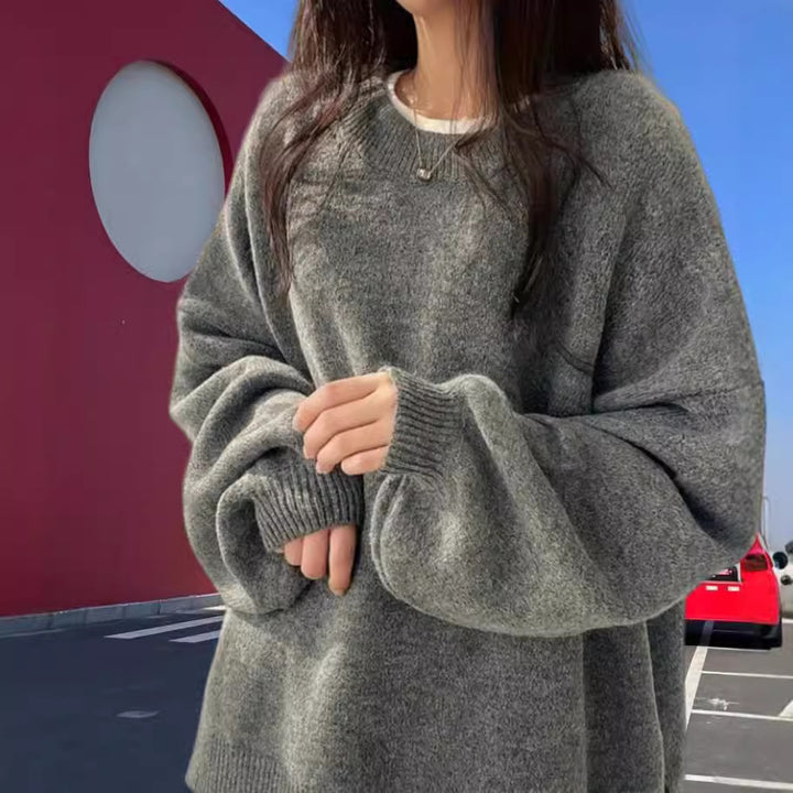 Oversized knit sweater for women with elegant puff sleeves and a modern design Lune London