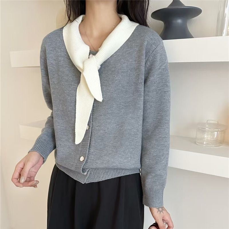 Fashionable women's cardigan with decorative scarf and button details Lune London