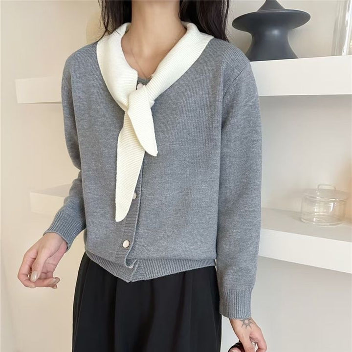 Fashionable women's cardigan with decorative scarf and button details Lune London