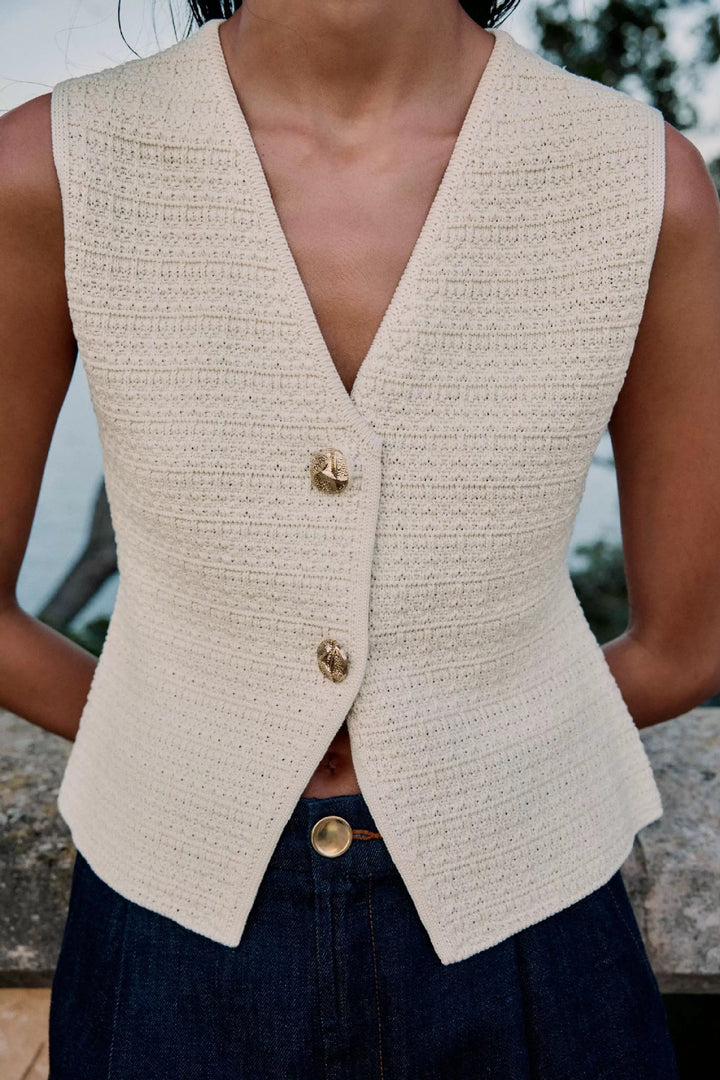 Ladies sleeveless cardigan with decorative buttons and beautiful texture Lune London