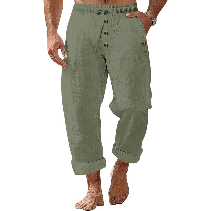 Casual beach pants for men with elastic waistband and practical button details Lune London