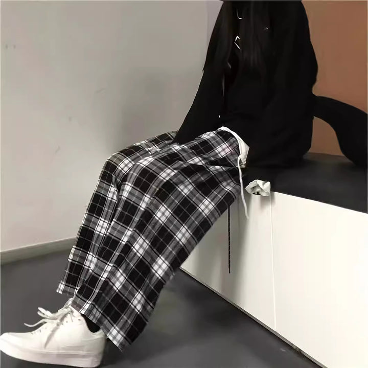 Wide plaid trousers for women with elastic waistband and tie belt Lune London