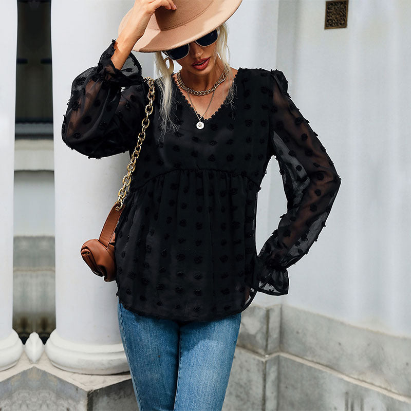 Elegant puff sleeve blouse for women with textured polka dot pattern Lune London